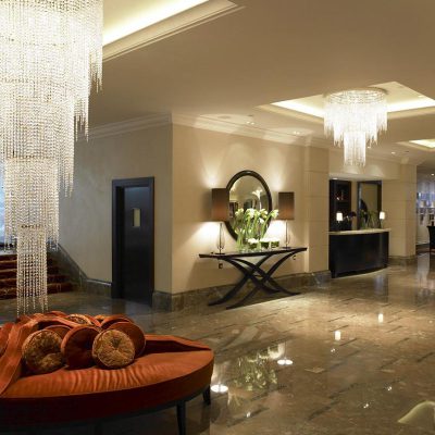 Ornate chandeliers and marble floors fill the Lobby at the Intercontinental Hotel Park Lane, London